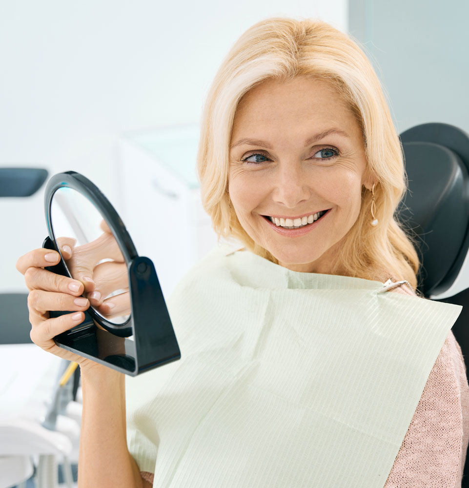 older patient with new confidence from smile makeover