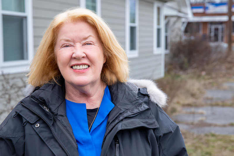 peggy after implants smiling happy